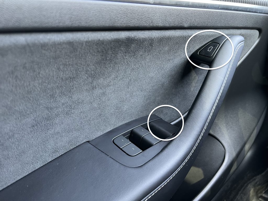 The Normal Door Open Button and the Manual Door Release Latch Inside a Model 3