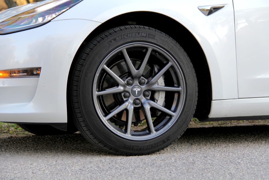 The Tesloid Aero Wheel Cap Kit on the Wheel of a Tesla Model 3 - Should Fit All Aero Wheels