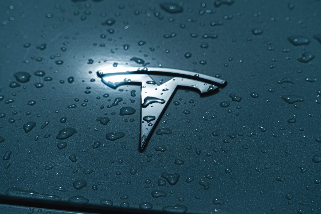 Tesla Emblem with Raindrops on it